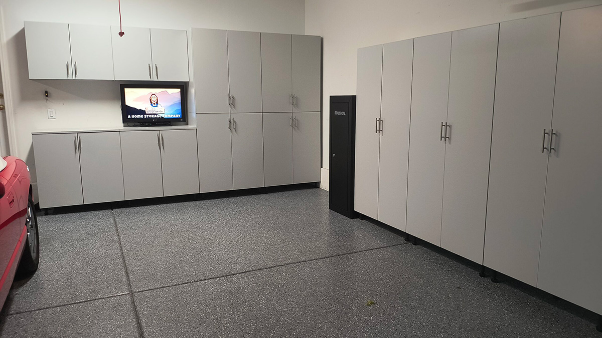 beautiful garage with DIY Bigfoot cabinet storage