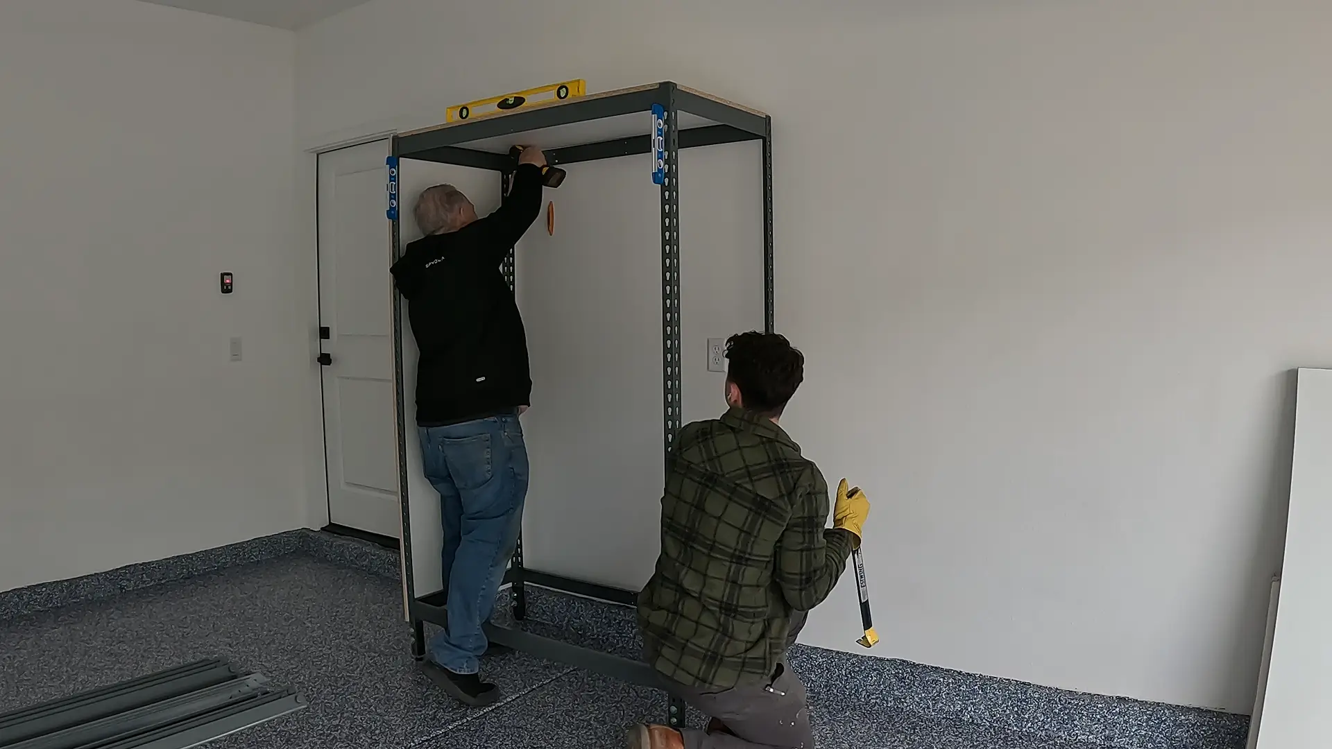 installing the steel frame for the bigfoot garage cabinet